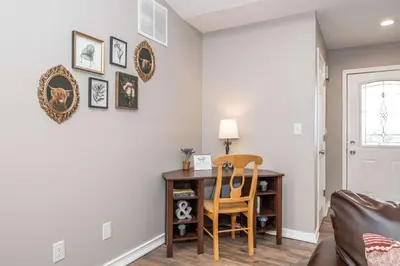 a home office with a desk and a chair at Main Street Cottage For 6 in Monroe