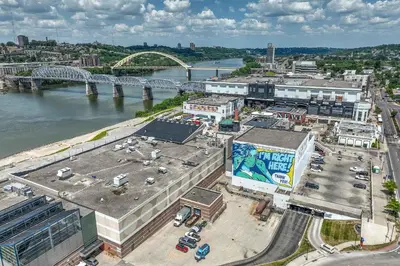 an overhead view of a city with a river and buildings at New Monmouth Loft 1 - City Chic 1 BDR in Newport
