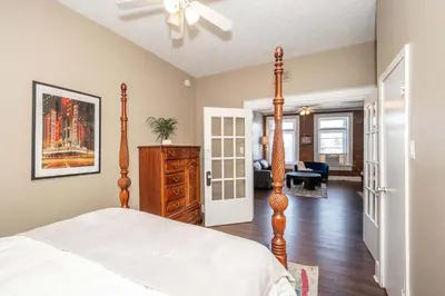 a bedroom with a bed and a living room at Monmouth Lofts - Newport Lofts Sleep 10 in Newport