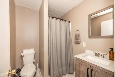 a bathroom with a toilet and a sink at Monmouth Lofts - Newport Lofts Sleep 10 in Newport