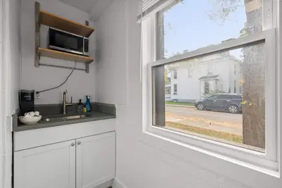 a kitchen with a sink and a window at Chic City Retreat 93I in Columbus