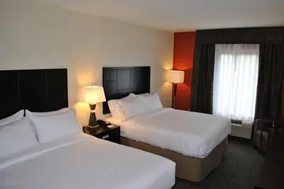 a hotel room with two beds and a window at Holiday Inn Express Salem by IHG in Salem