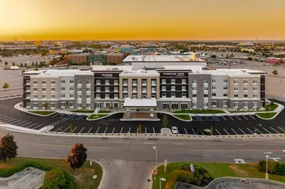 an aerial view of a building with a parking lot at Fairfield Inn & Suites Dayton Beavercreek in Beavercreek