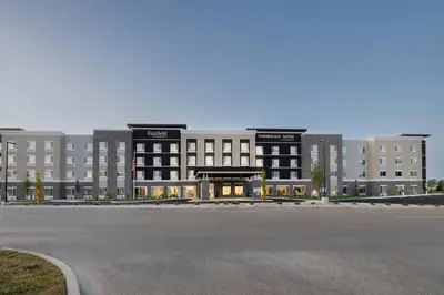 an empty parking lot in front of a large building at Fairfield Inn & Suites Dayton Beavercreek in Beavercreek