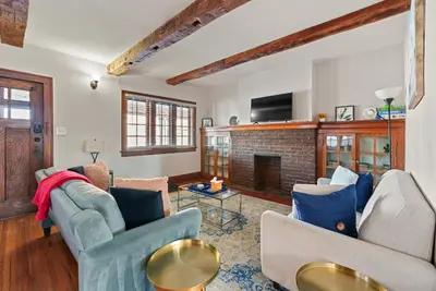 a living room with two couches and a fireplace at Tibet Twins 1 Cozy Stay for 6 in Columbus