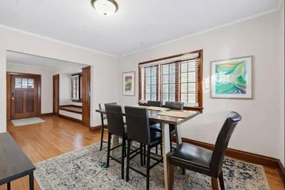 a dining room with a table and chairs at Tibet Twins 2 Retreat for 6 in Columbus