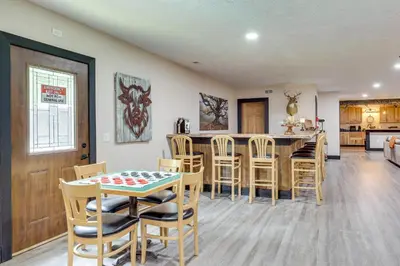 a kitchen and dining room with a table and chairs at 6 Mi to Main Street Dog-Friendly Home in Dover! in Dover