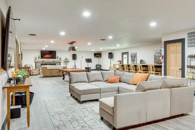 a living room with a couch and a table at 6 Mi to Main Street Dog-Friendly Home in Dover! in Dover
