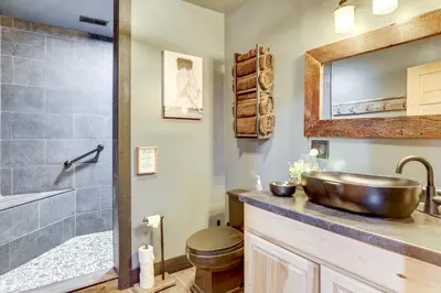 a bathroom with a sink and a shower at 6 Mi to Main Street Dog-Friendly Home in Dover! in Dover