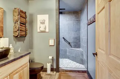 a bathroom with a shower with a toilet and a sink at 6 Mi to Main Street Dog-Friendly Home in Dover! in Dover