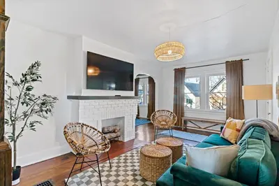 a living room with a couch and a fireplace at The Green Escape in Oakley 2 bed 1 bath in Cincinnati