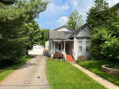 a house on a street with a driveway at HydePark Abode Two 1st flr bedrms in Cincinnati