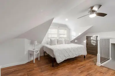 a white bedroom with a bed and a ceiling fan at Newly renovated Spacious & Cozy 3Bd Home in Oakley in Cincinnati