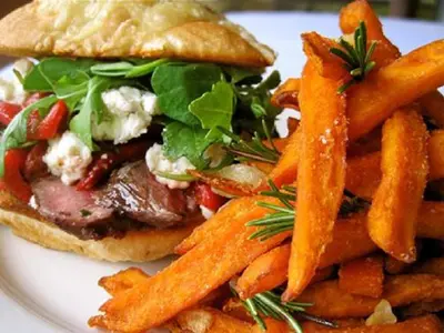a sandwich and french fries on a white plate at Granville Inn in Granville