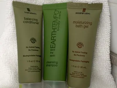 three bottles of moisturizing hair gel on a shelf at Granville Inn in Granville