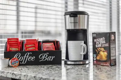 a coffeemaker and a coffee bar on a counter at Near DT & CLE Clinic Queen Bed Wi-Fi Parking in Cleveland