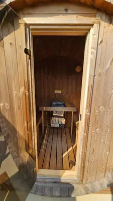 an inside view of a sauna with a table in it at The Mysa - Couples Retreat, Luxe, Sauna, Hot tub in Rockbridge
