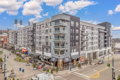 an overhead view of a large building on a street at CozySuites - Current at the Banks in Cincinnati
