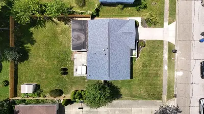 an overhead view of a building in a yard at Private Home - Entire House - Ranch - Hot Tub - Pets Welcome - 2 King Beds - Kids Welcome - Fenced Yard - Free Wifi - Quiet Neighborhood in Columbus