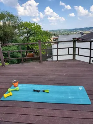 a blue yoga mat with a pair of scissors on it at Luxe Mt Adams Lookout in Cincinnati