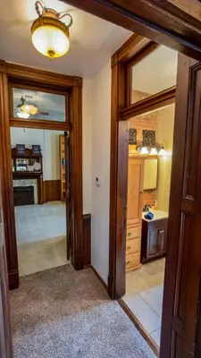 an open doorway to a bathroom with a sink at Court St Suite in Clarksburg