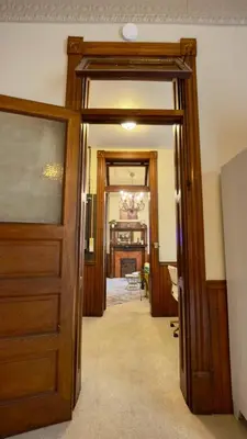 a door leading into a room with a hallway at Court St Suite in Clarksburg