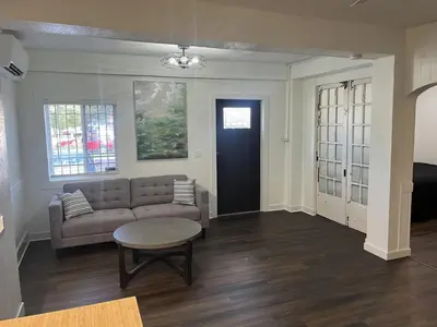 a living room with a couch and a table at Apartment in Newark in Newark