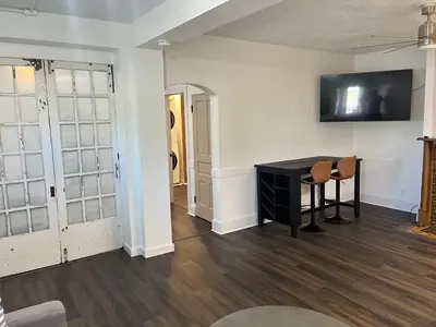 an empty room with a desk and a mirror at Apartment in Newark in Newark