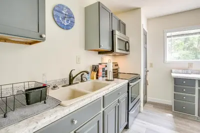 a kitchen with a sink and a counter at Boat Dock Couples Grand Lake Getaway!