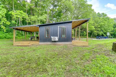 a small black house with a large yard at BBQ Ready Retreat on Rice Near Licking River