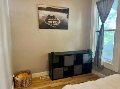 a room with a table and a window at Jungle House Columbus Downtown Free Parking Sleeps 8 - Near Convention Center & Nationwide Arena - 2BR Short North Luxury Home - Over 5,800 Five Star Stays in Columbus
