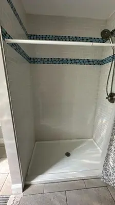 a shower with a white tub in a bathroom at Jungle House Columbus Downtown Free Parking Sleeps 8 - Near Convention Center & Nationwide Arena - 2BR Short North Luxury Home - Over 5,800 Five Star Stays in Columbus