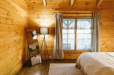 a bedroom with a bed and a window at 