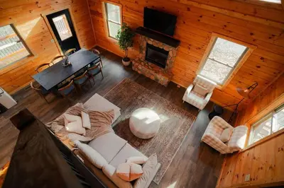an overhead view of a living room with a fireplace at Memories at Hillside A Modern Cabin Hocking Hills in McArthur