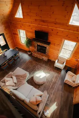 an overhead view of a living room with a fireplace at Memories at Hillside A Modern Cabin Hocking Hills in McArthur