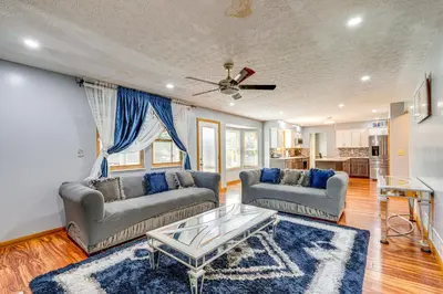 a living room with two couches and a table at Families Welcome Lake-View Home, 2 Mi to Gahanna! in Columbus