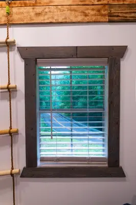 a window in a room with a window blind at Boons Camp Cabin