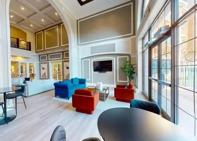 a large living room with tables and chairs at Landing Spectacular 2BD Clubhouse Pool in Cincinnati