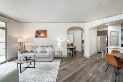 a living room with a couch and a table at Landing Spectacular 2BD Clubhouse Pool in Cincinnati