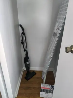 a vacuum cleaner in the corner of a room at Maple Heights 3BR Cozy and Spacious in Maple Heights