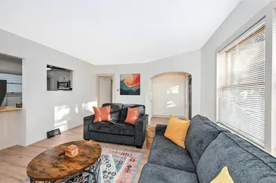 a living room with a couch and a table at Cozy 2BR Lyndhurst Retreat in Lyndhurst