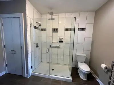 a bathroom with a shower and a toilet at Bexley Bed and Breakfast in Columbus