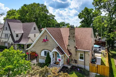 an aerial view of a house with a roof at Modern Group Getaway with Private Yard in Cincinnati in Cincinnati