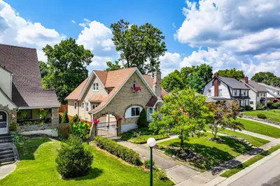 a group of houses in a residential neighborhood at Modern Group Getaway with Private Yard in Cincinnati in Cincinnati