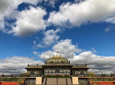 a building with a dome on top of it at Buddhas Little Cabin! 1 min from Palace of Gold in Moundsville