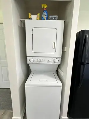 a white washer and dryer in a kitchen at KING bed, Pet Friendly, Modern Retreat in CLE-BW in Berea