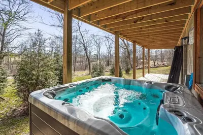 a hot tub in the backyard of a house at Modern Luxury I Hot Tub I Hiking in McArthur