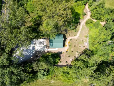 an overhead view of a garden with a pond at Honey Bear Cabin in Millersburg