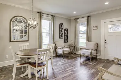 a dining room with a table and chairs at Modern Comfort Near Columbus Home with Yard and Porch in London