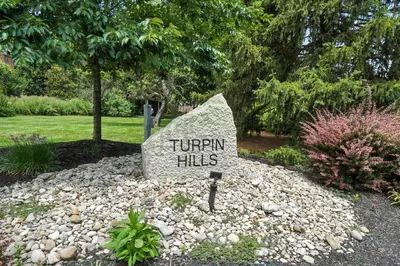 a sign that says turnavan hills in a garden at 10 Mi to Dtwn Cozy Couples Getaway in Cincinnati in Cincinnati